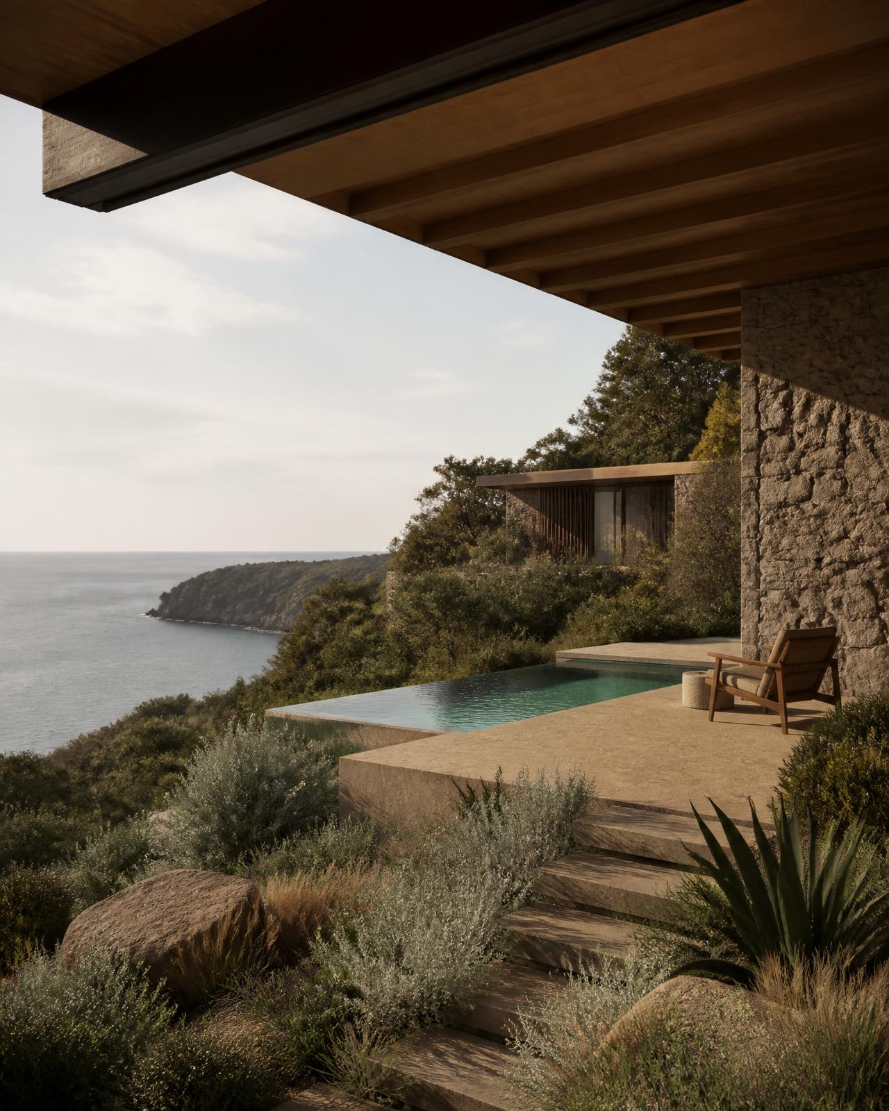 contemporary design-led resort architecture above a quiet bay